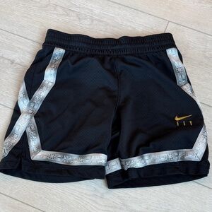 Nike Black Shorts with Gold and Silver Accents